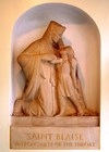Photo showing statue of St Blaise, which was in the lobby of the Royal National Throat Nose and Ear Hospital. 